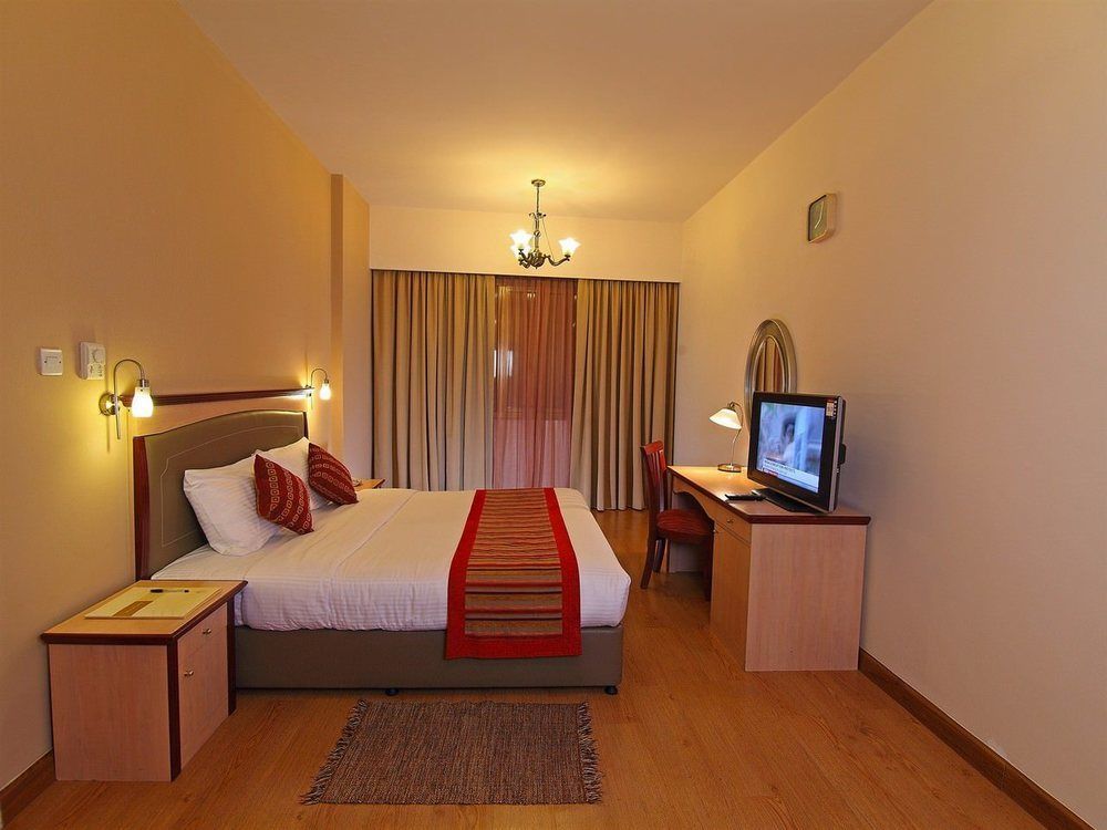 Florida City Hotel Apartments Дубай Екстер'єр фото