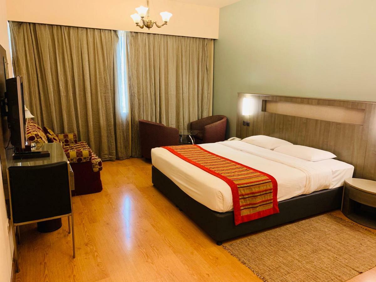 Florida City Hotel Apartments Дубай Екстер'єр фото